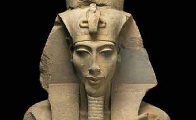 Pharonic Statue of Man in Headdress Holding Shrine to Osiris
