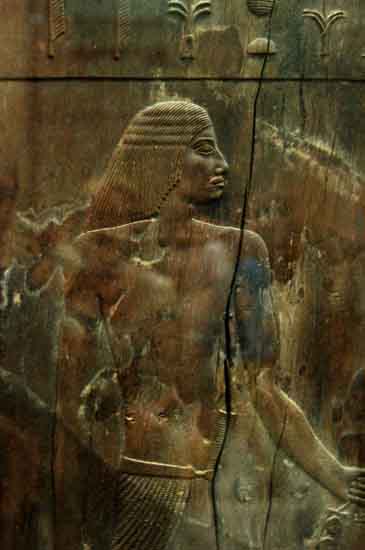 Pharonic Statue of Man in Headdress Holding Shrine to Osiris