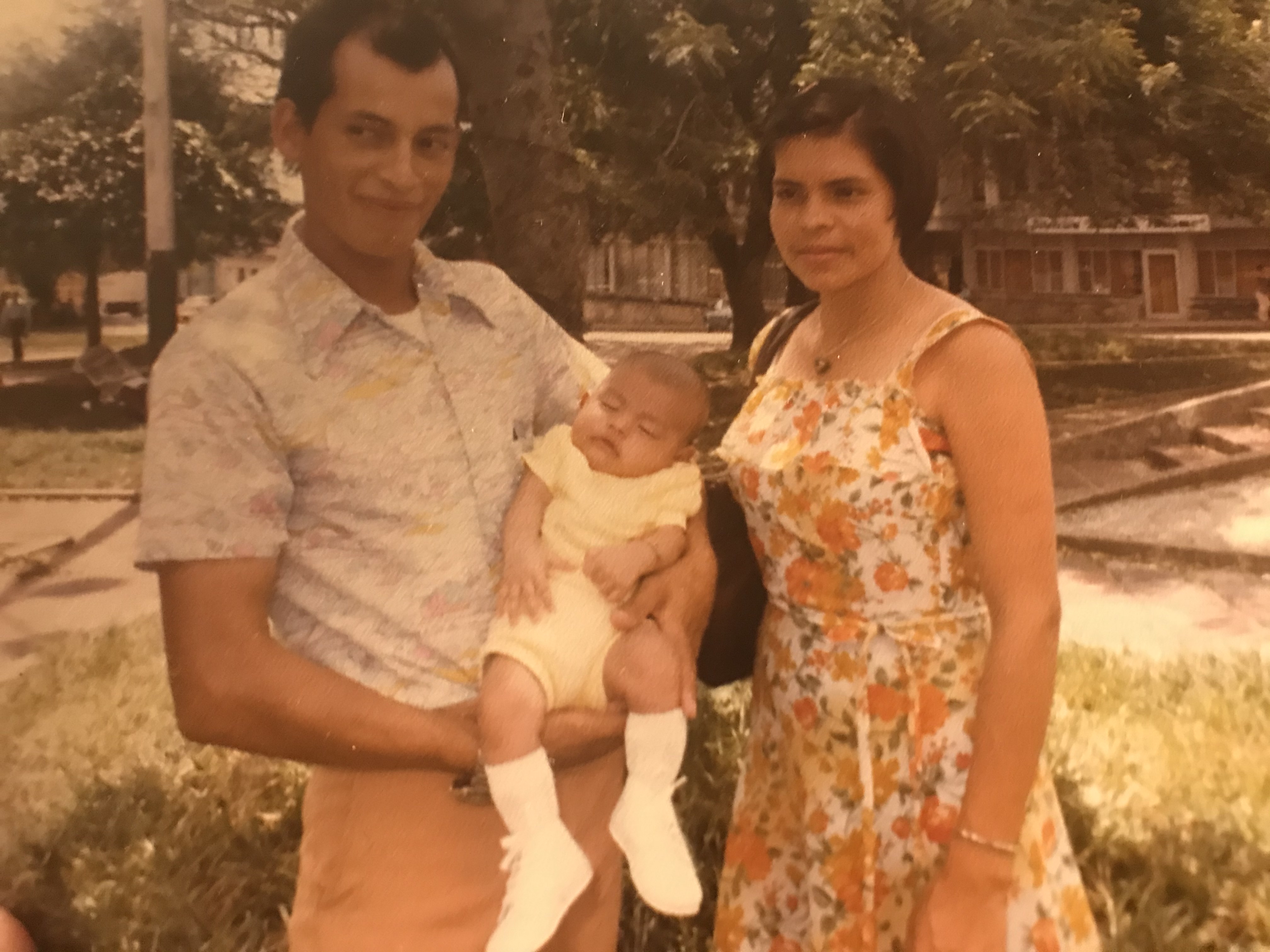 Carlos as a baby with his parents